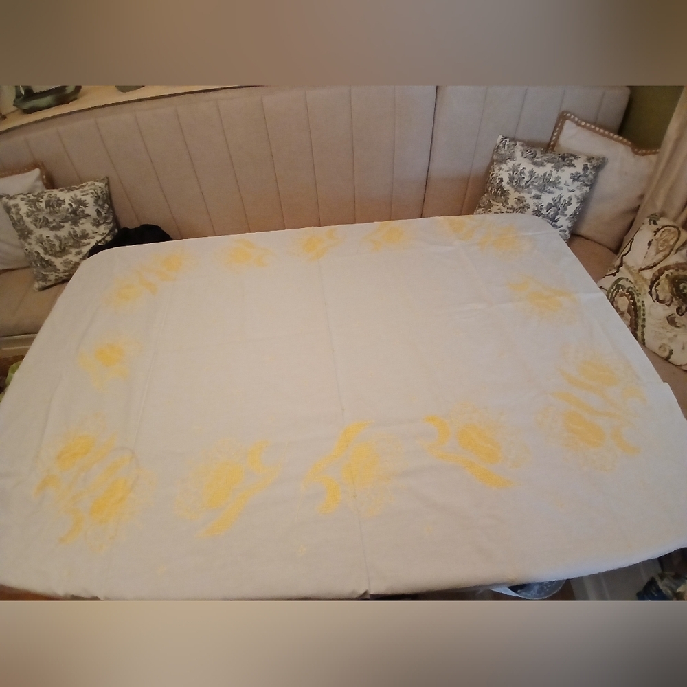 Vintage Cross Stitch Design On White Scalloped Tablecloth